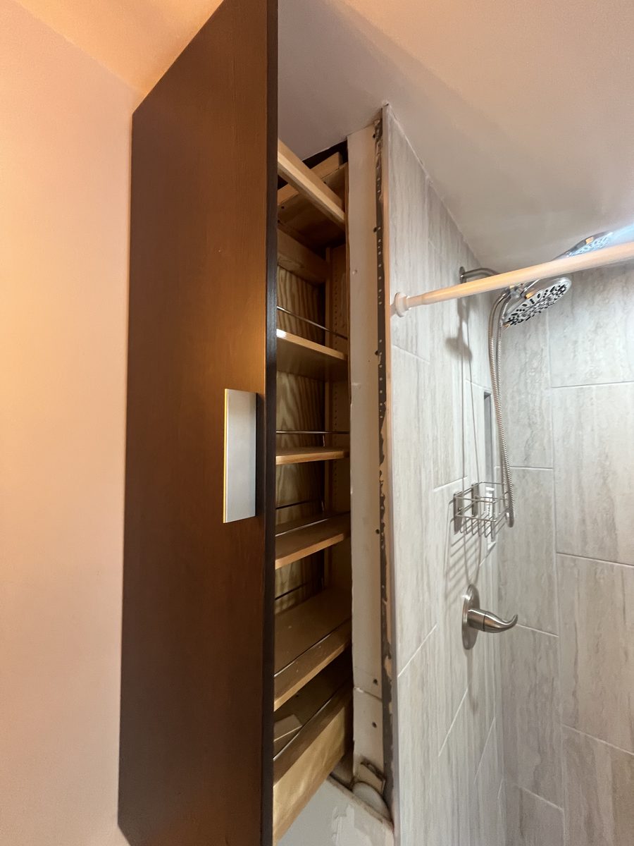 Custom built-in bathroom pull-out cabinet storage Saint Paul Minnesota - JAM Custom Carpentry