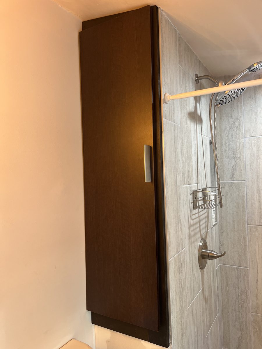 Custom bathroom built-in storage cabinet closed sleek Saint Paul Minnesota - JAM Custom Carpentry