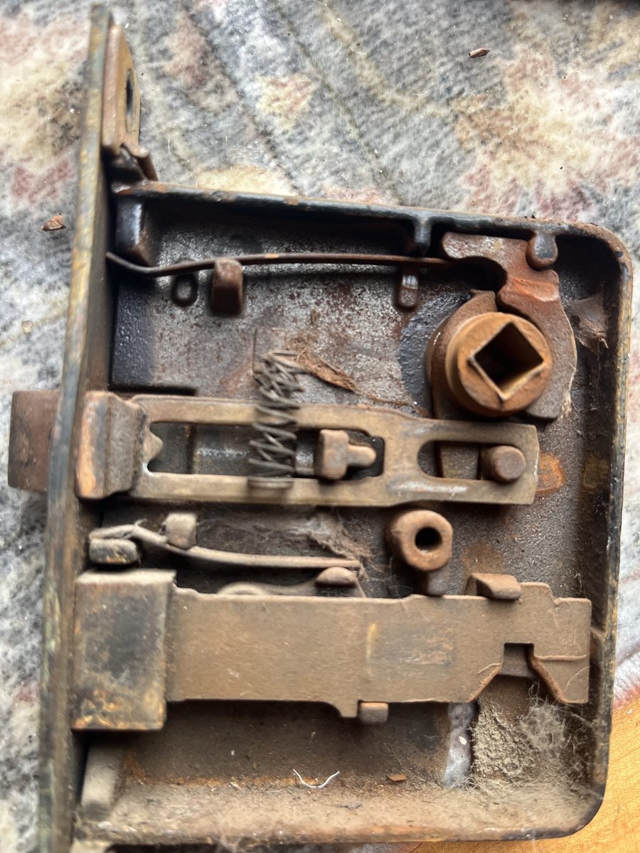 Old rusted mortise lock before restoration historic home Minneapolis Saint Paul - JAM Custom Carpentry