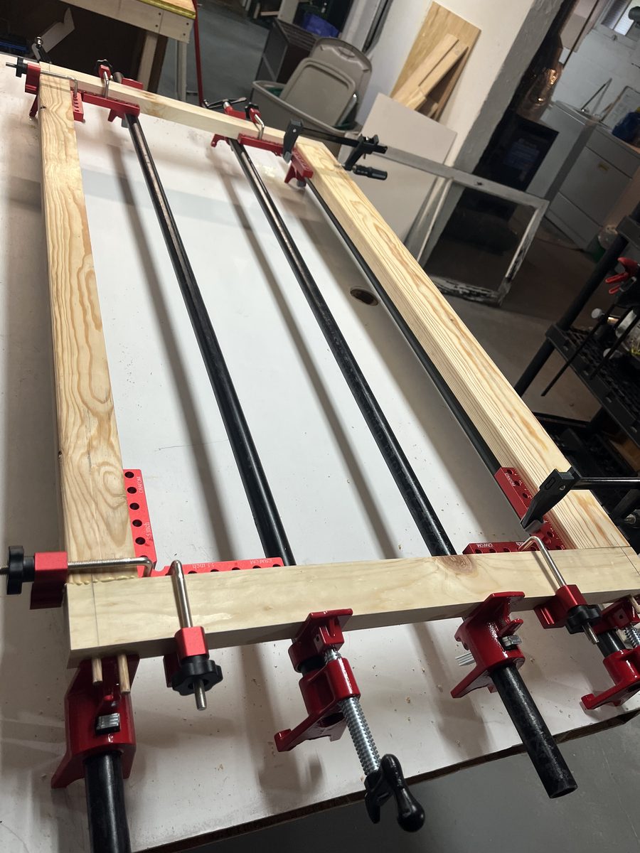 Large panel shop glue-up pipe clamps custom millwork Saint Paul - JAM Custom Carpentry