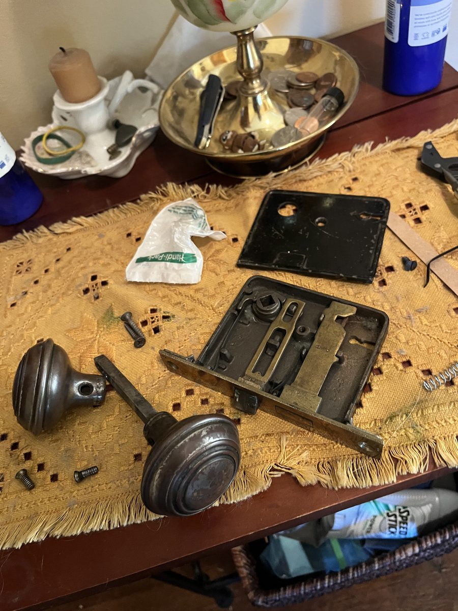 Mortise lock disassembled for repair historic home Saint Paul Minnesota - JAM Custom Carpentry