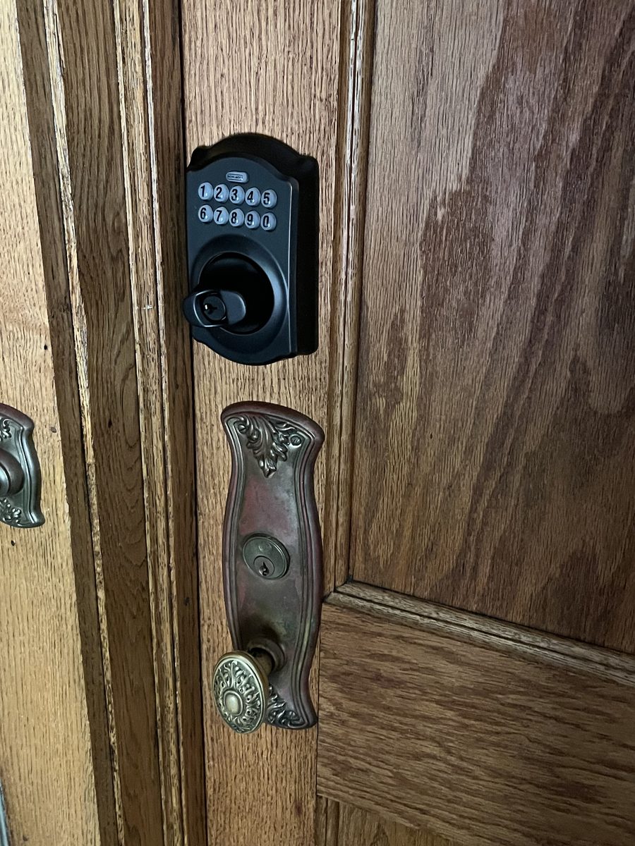 Schlage keypad deadbolt with antique ornate knob historic home Saint Paul - JAM Custom Carpentry