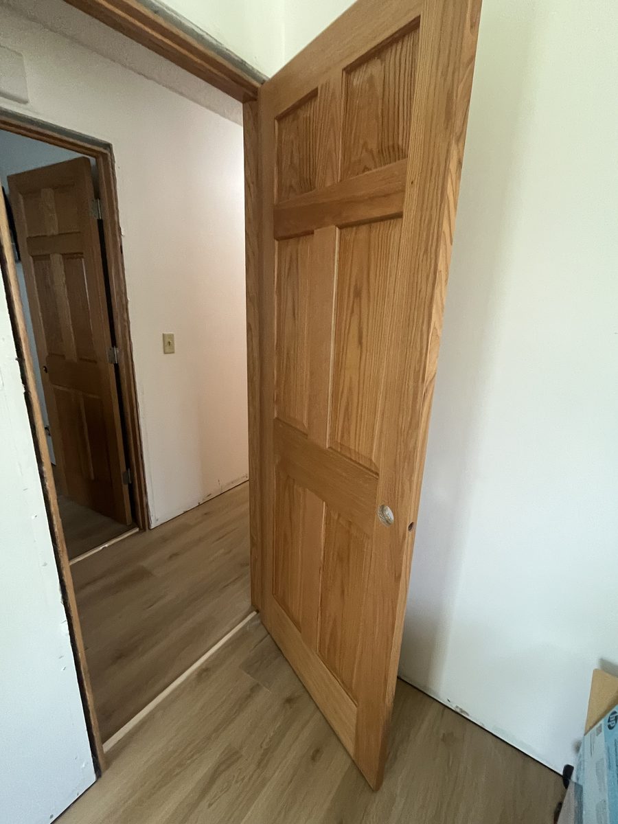6 panel solid oak door hung and trimmed Minneapolis Minnesota - JAM Custom Carpentry