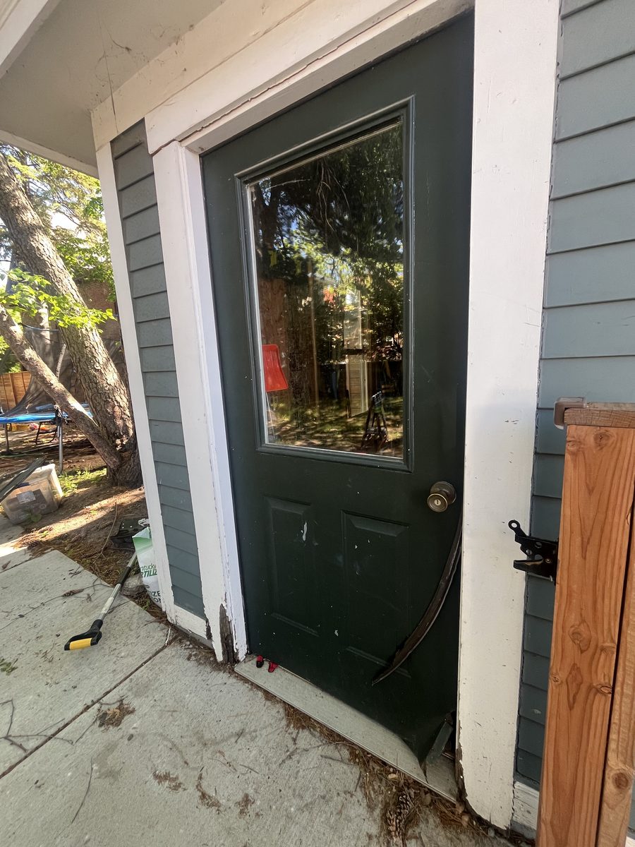 Exterior door before replacement rotted trim Saint Paul Minnesota - JAM Custom Carpentry