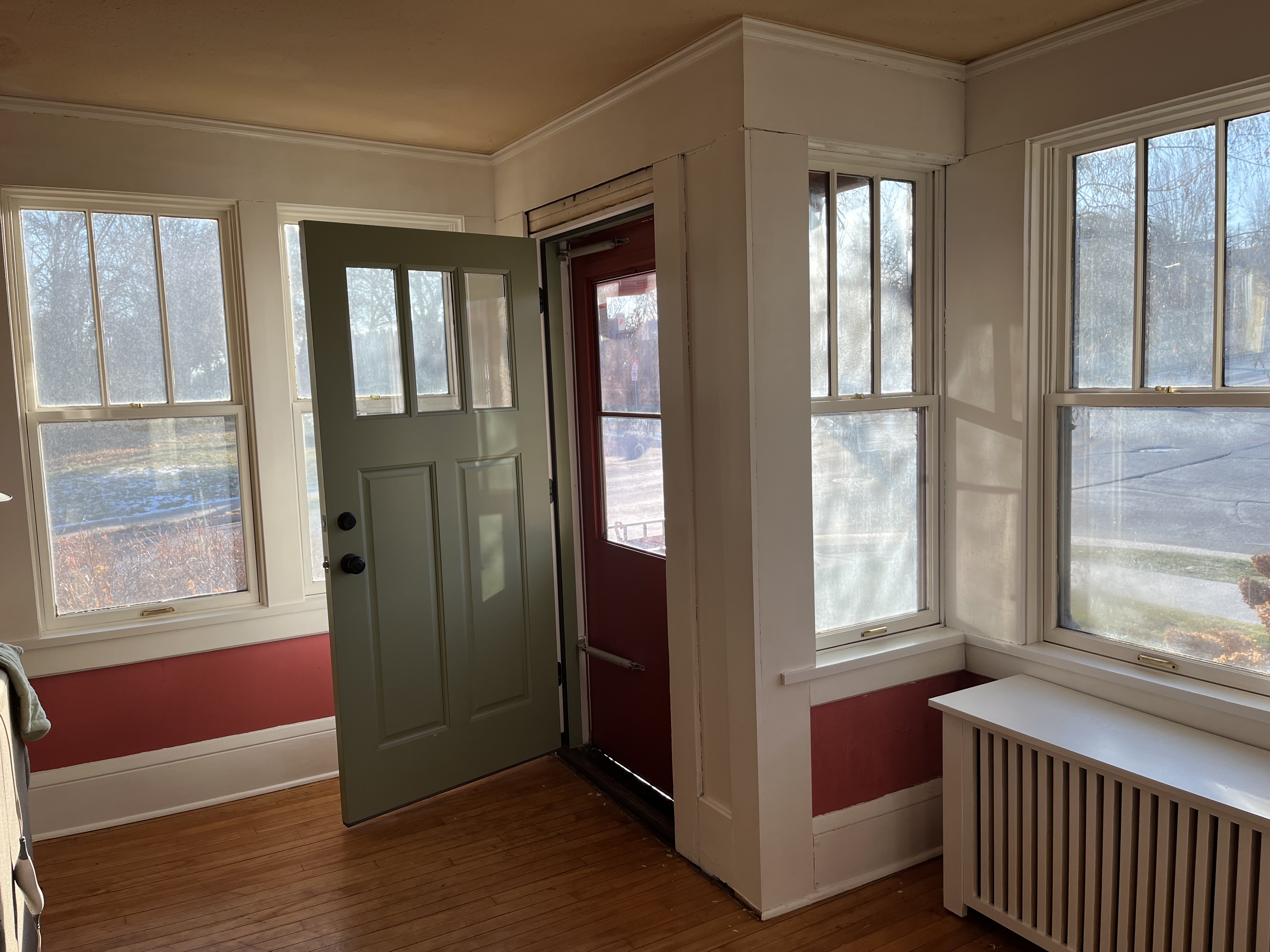 JAM Custom Carpentry - Historic home green door and original windows