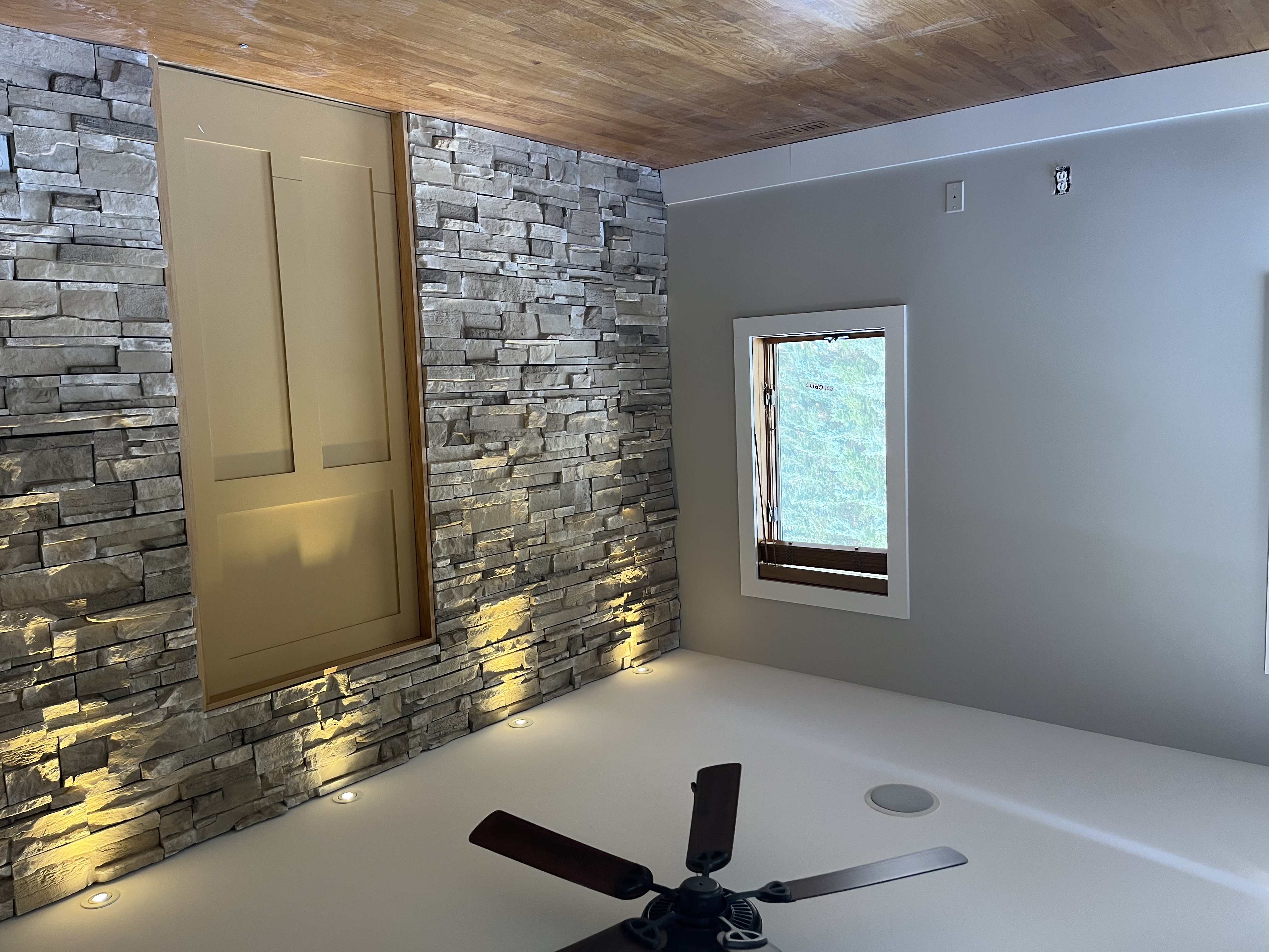 Stone wall with door and trim